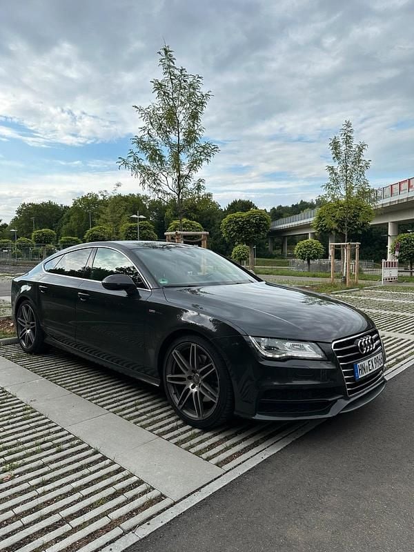 Grau Gebraucht 2014 Audi A7 Sportback S-Line Kleinwagen | 14.800 € (Superpreis) - Bild 1/4