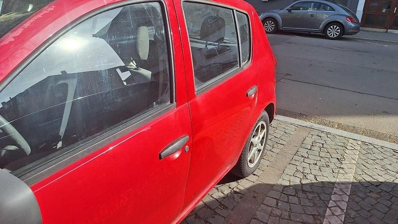 Gebraucht Dacia Sandero 75 PS (55 kW) 2009 Rot Kleinwagen