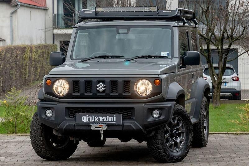 Grau Gebraucht 2024 Suzuki Jimny Comfort SUV | 37.990 € (Teuer) - Bild 1/4
