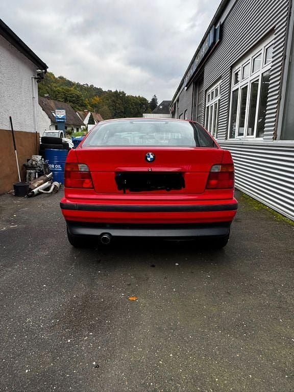 Gebraucht BMW 316 102 PS (75 kW) 1997 Rot Limousine