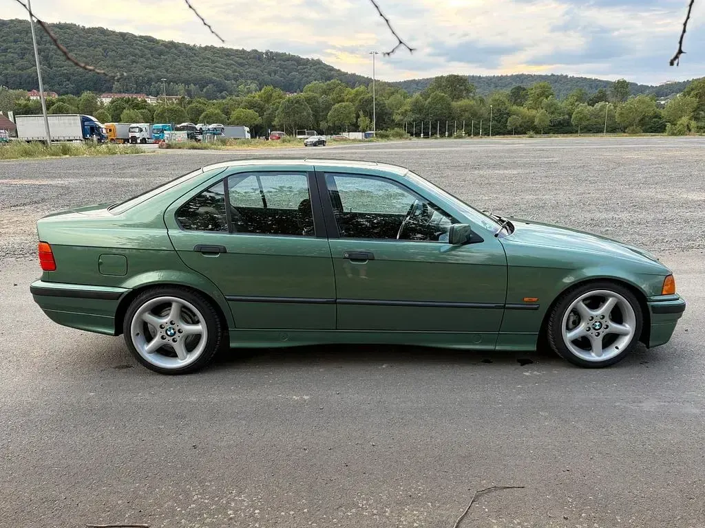Gebraucht BMW 318 Basis 116 PS (85 kW) 1997 Grün Limousine
