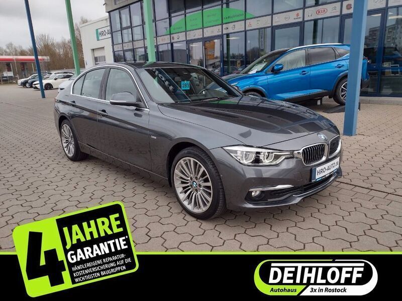 Grau Gebraucht 2018 BMW 320 Luxury Line Limousine | 26.860 € (Teuer) - Bild 1/4