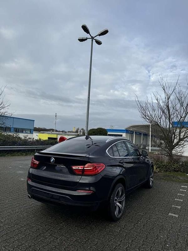 Schwarz Gebraucht 2015 BMW X4 SUV | 21.499 € (Fairer Preis) - Bild 1/4