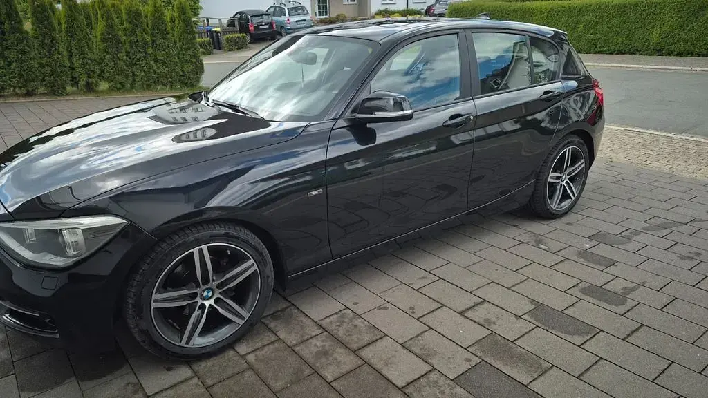 Gebraucht BMW 116 Sport Line 136 PS (100 kW) 2012 Schwarz Kleinwagen
