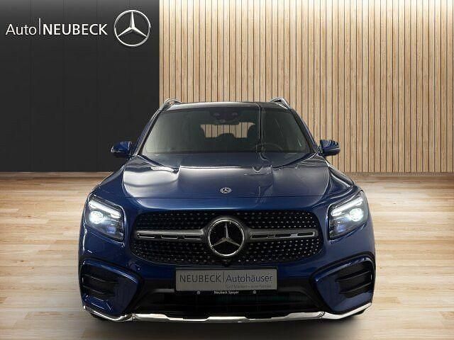 Lack spektralblau Gebraucht 2024 Mercedes GLB220 AMG line SUV | 56.700 € - Bild 1/2