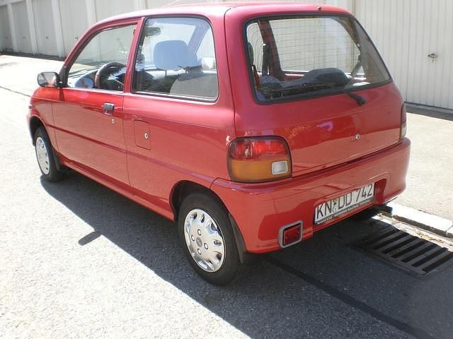 Gebraucht Daihatsu Cuore 48 PS (35 kW) 1995 Rot Kleinwagen