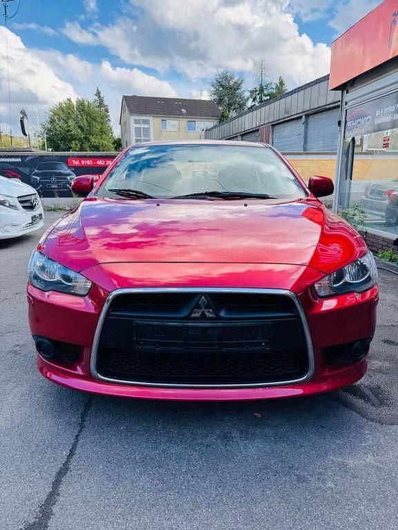 Rot Gebraucht 2009 Mitsubishi Lancer Sportback Inform Limousine | 6.900 € (Fairer Preis) - Bild 1/4