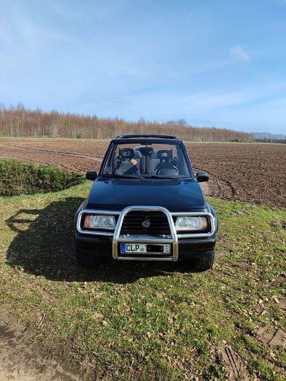 Gebraucht Suzuki Vitara 80 PS (58 kW) 1992 Schwarz Cabrio