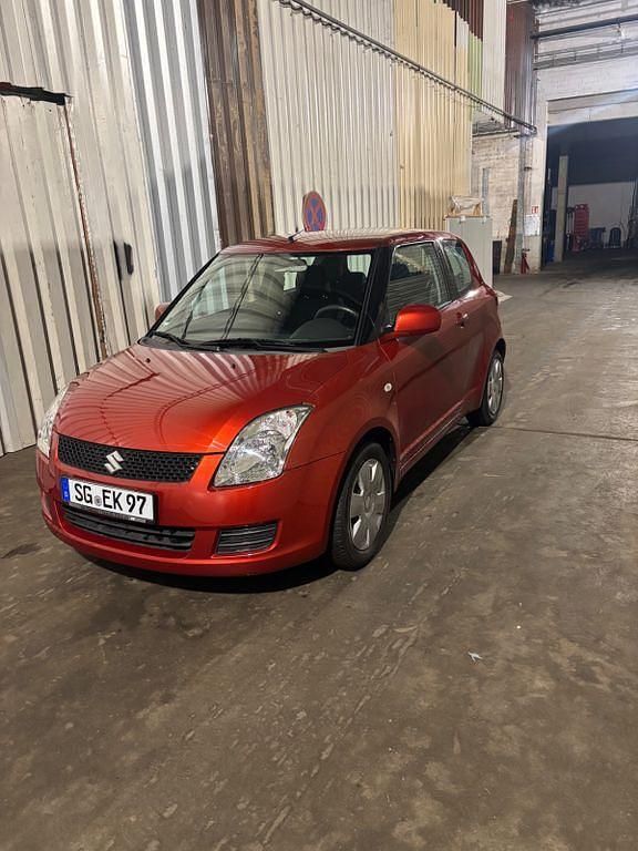 Gebraucht Suzuki Swift 92 PS (67 kW) 2010 Orange Kleinwagen