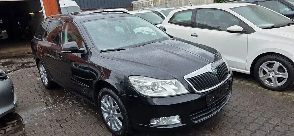 Gebraucht Skoda Octavia Family 110 PS (80 kW) 2011 Schwarz Kombi