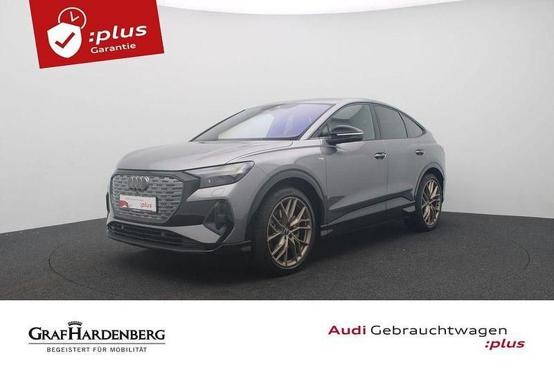 Taifungrau metallic Gebraucht 2024 Audi Q4 Sportback e-tron Ambiente SUV | 49.980 € (Teuer) - Bild 1/4