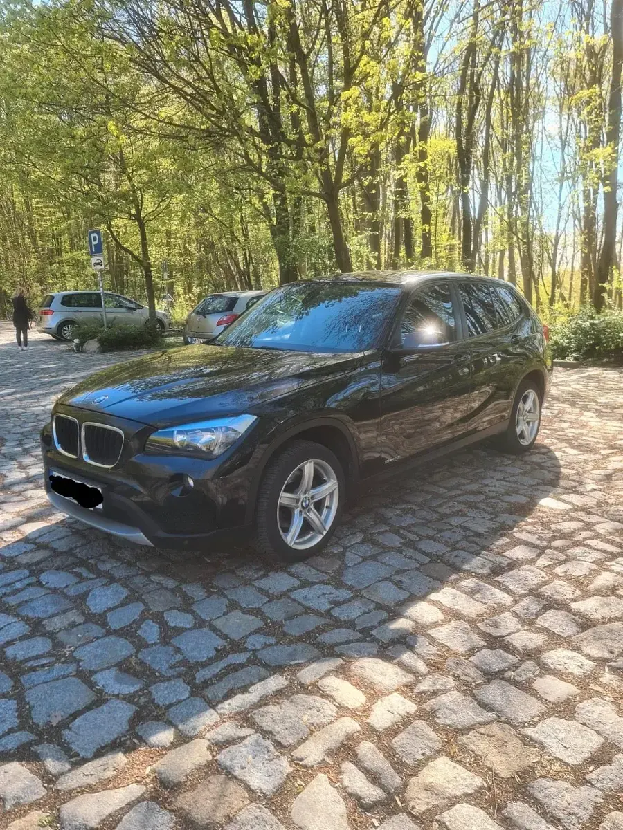 Second-hand BMW X1 150 CP (110 kW) 2012 Negru SUV