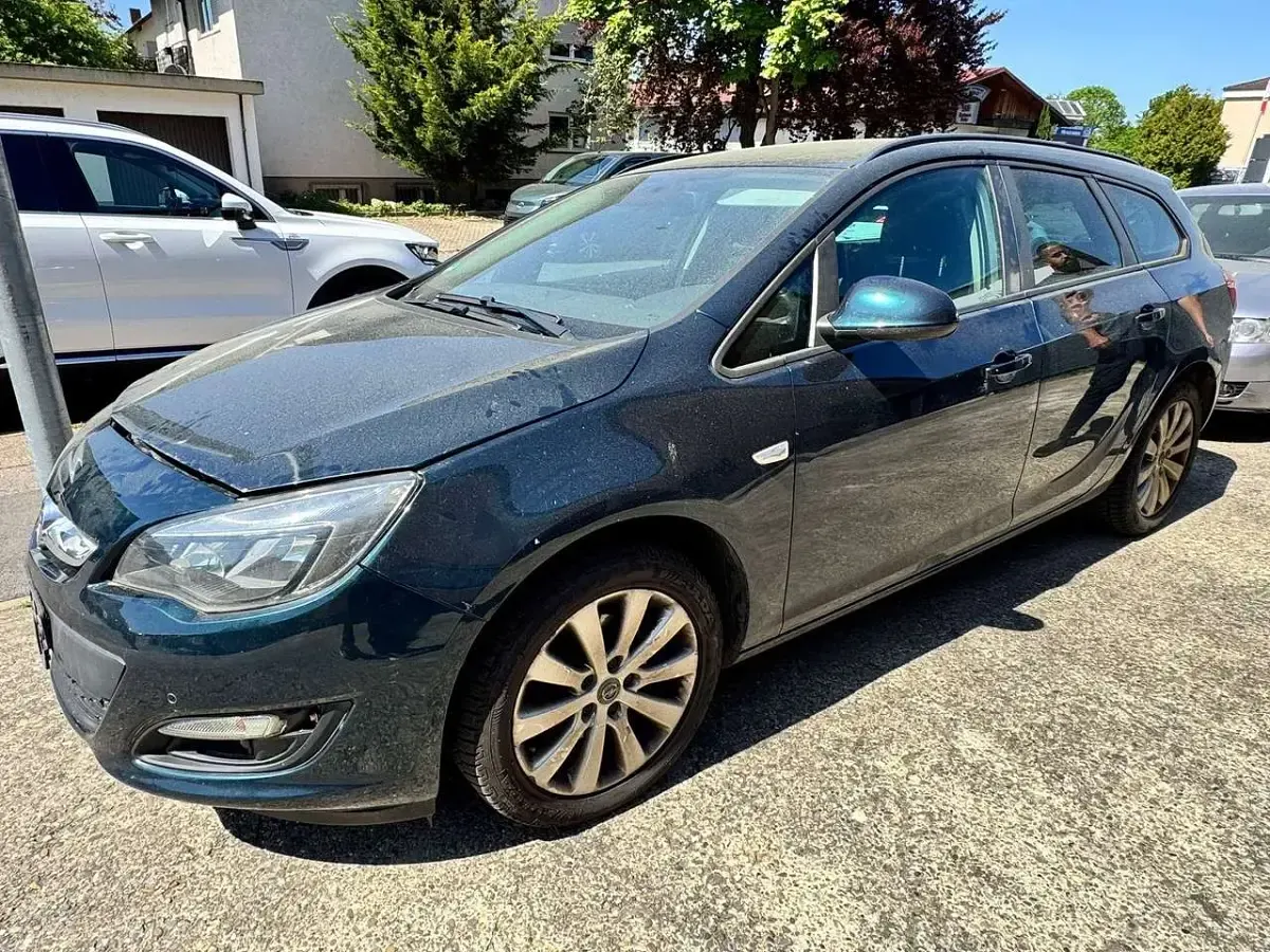 Gebraucht Opel Astra Style 110 PS (80 kW) 2016 Smaragd gruen (mi) Kombi