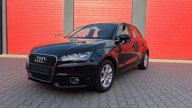 Schwarz Gebraucht 2013 Audi A1 Sportback Attraction Kleinwagen | 8.499 € (Guter Preis) - Bild 1/4
