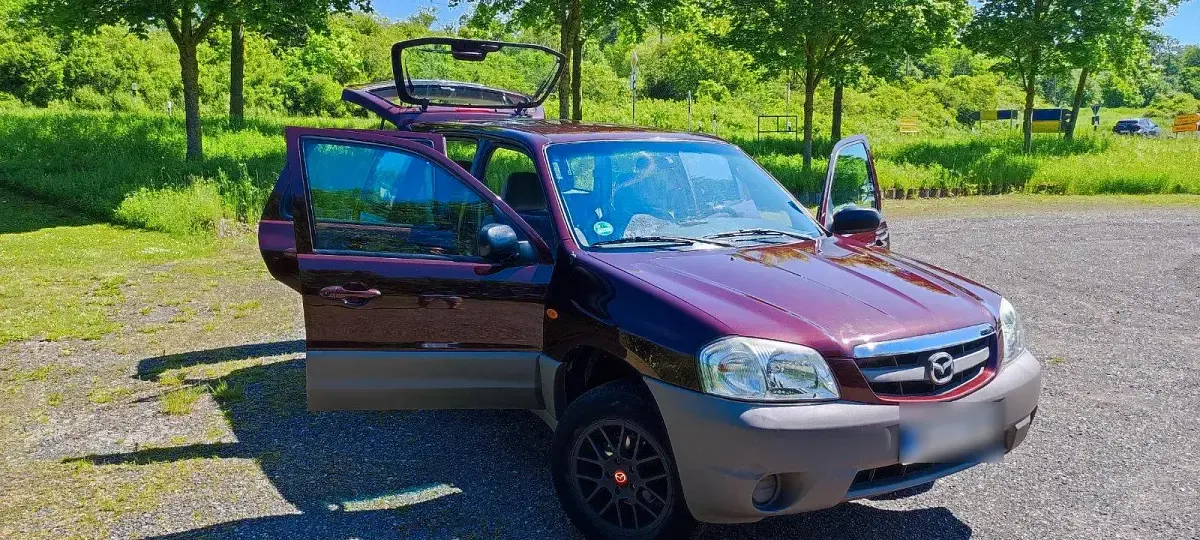 Gebraucht Mazda Tribute 124 PS (91 kW) 2002 Rot SUV