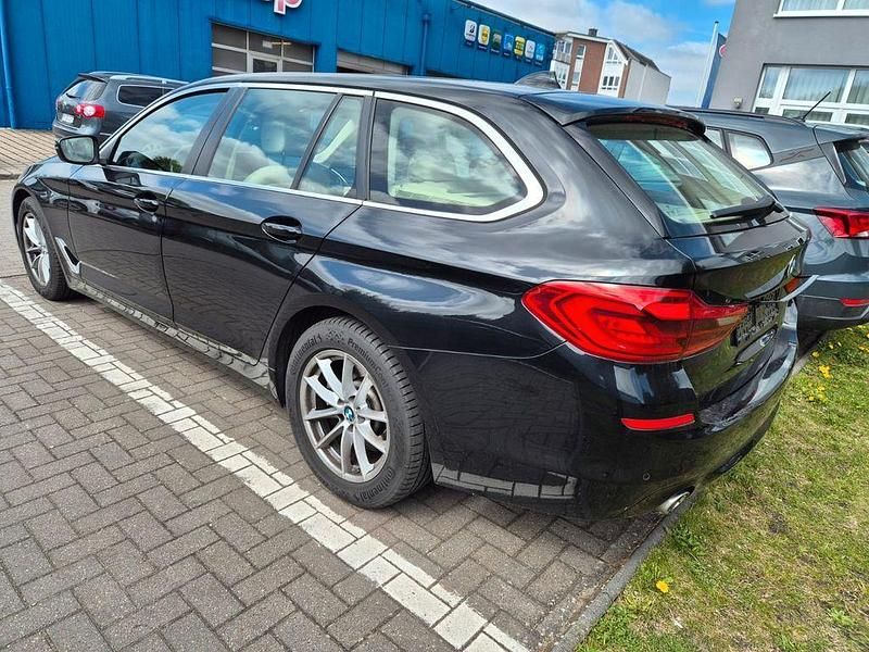 Second-hand BMW 520 Performance 190 CP (139 kW) 2019 Negru Break