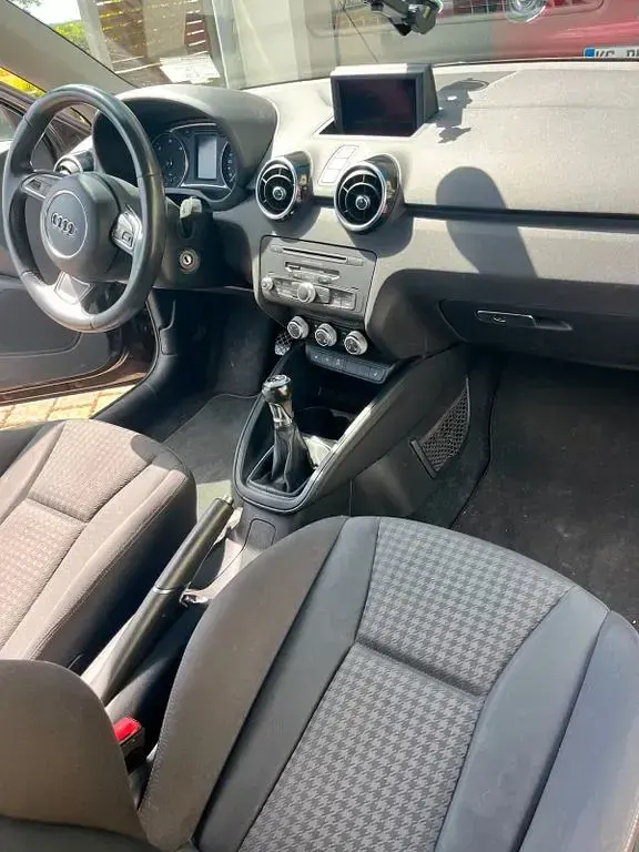 Gebraucht Audi A1 Attraction 90 PS (66 kW) 2013 Braun Kleinwagen