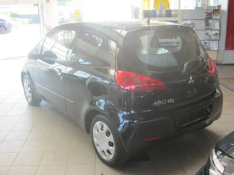 Gebraucht Mitsubishi Colt Inform 95 PS (69 kW) 2006 Cosmos schwarz Limousine