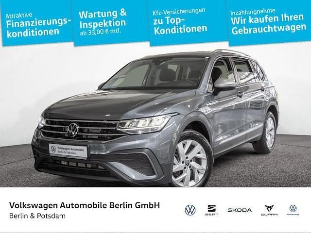 Platinum grey metallic Gebraucht 2024 VW Tiguan Allspace Life SUV | 35.433 € (Fairer Preis) - Bild 1/4