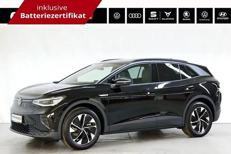 Grenadillschwarz metallic Gebraucht 2023 VW ID.4 Pro Performance SUV | 30.889 € (Fairer Preis) - Bild 1/3
