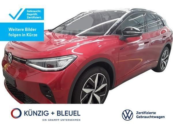 Rot (kings red metallic) Gebraucht 2024 VW ID.4 GTX SUV | 43.991 € (Fairer Preis) - Bild 1/4