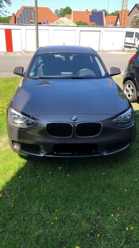 Braun Gebraucht 2014 BMW 116 Kleinwagen | 8.500 € - Bild 1/4