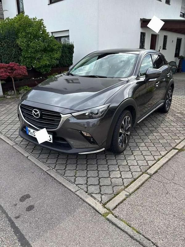 Grau Gebraucht 2021 Mazda CX-3 Homura-Line SUV | 19.999 € (Fairer Preis) - Bild 1/4
