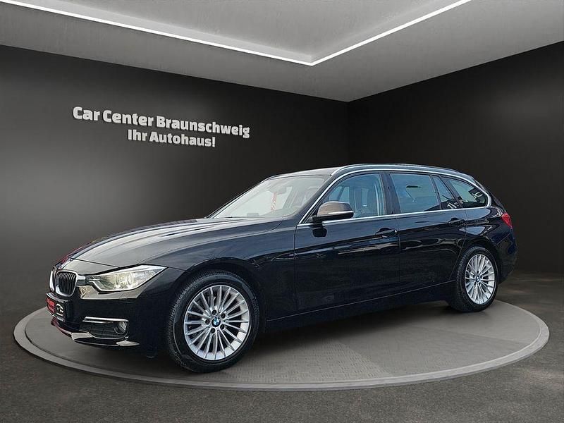 Schwarz Gebraucht 2012 BMW 320 Performance Kombi | 8.999 € (Fairer Preis) - Bild 1/4