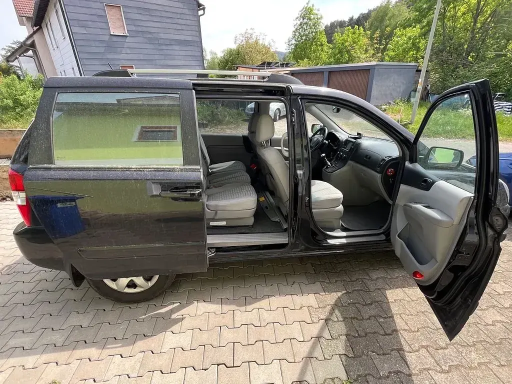 Gebraucht Kia Carnival Basis 185 PS (136 kW) 2009 Schwarz Van / Kleinbus