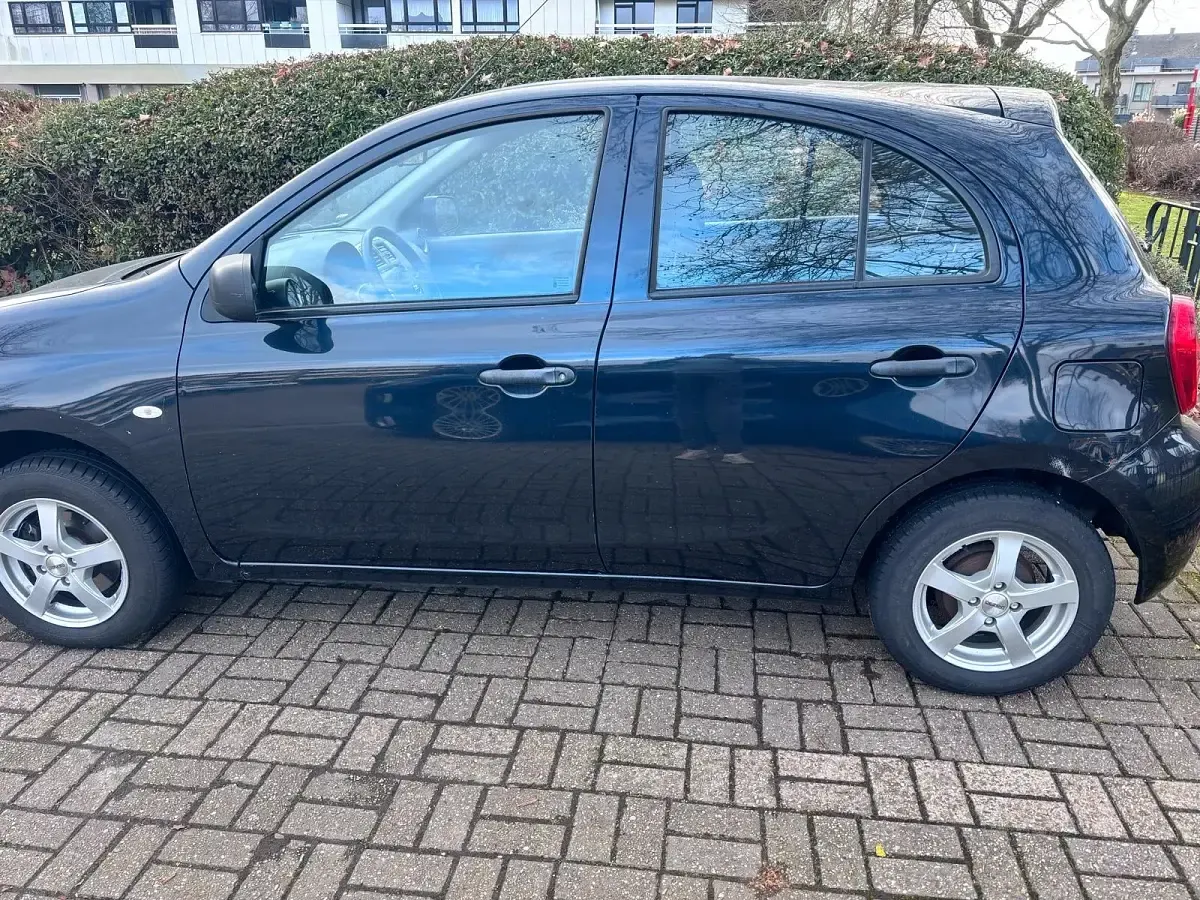 Gebraucht Nissan Micra 80 PS (58 kW) 2014 Schwarz Kleinwagen