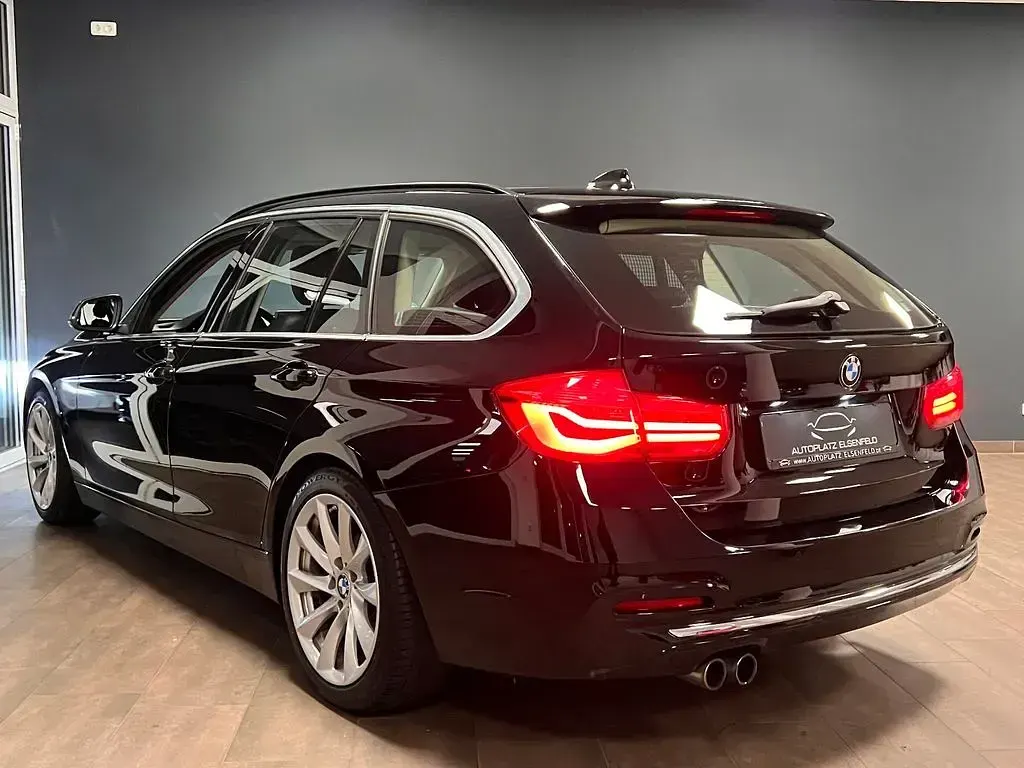 Second-hand BMW 330 Luxury Line 252 CP (185 kW) 2015 Negru Break