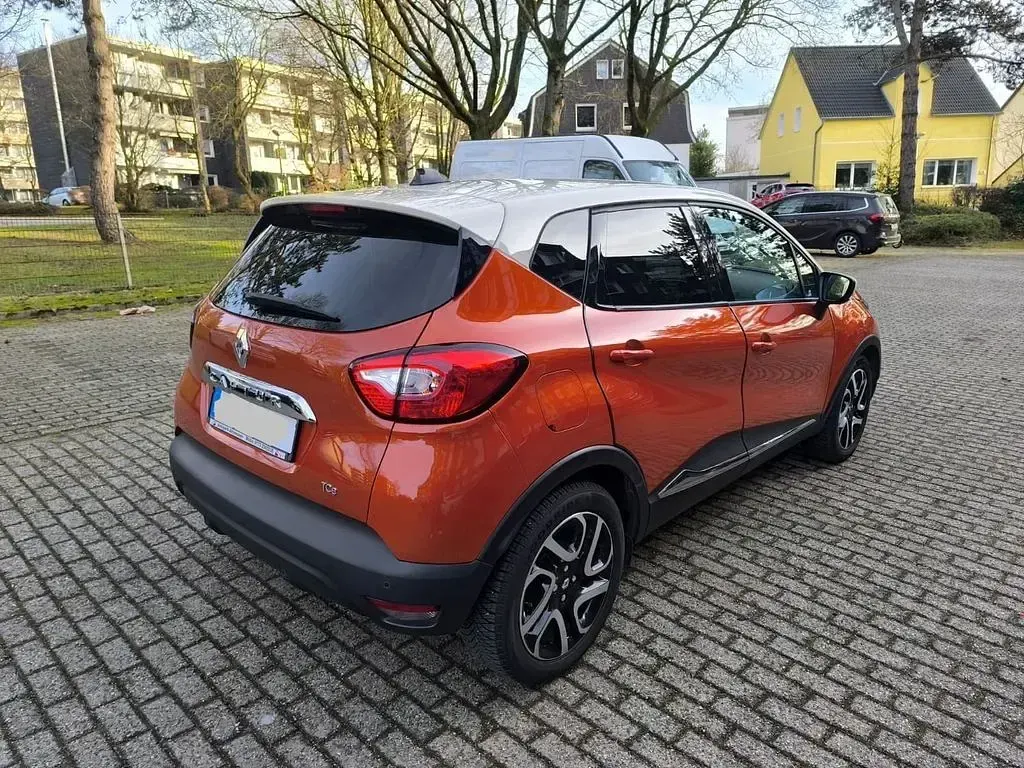 Używany Renault Captur Luxe 120 KM (88 kW) 2015 Pomarańczowy SUV