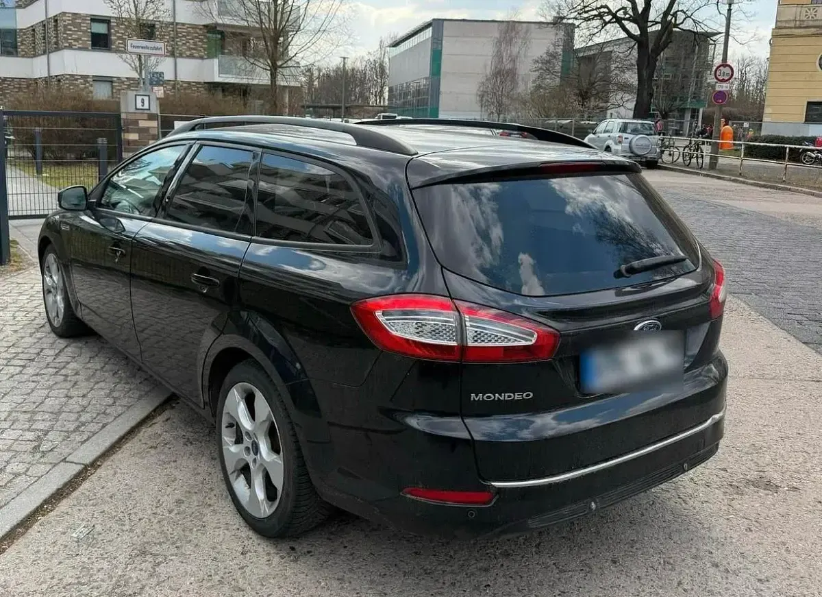 Używany Ford Mondeo 115 KM (84 kW) 2011 Czarny Kombi