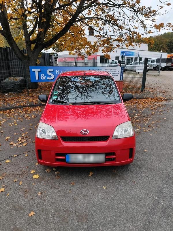Gebraucht Daihatsu Cuore 58 PS (42 kW) 2003 Rot Kleinwagen