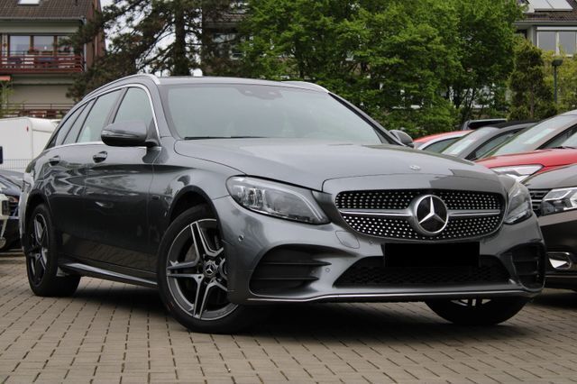 Selenitgrau Gebraucht 2021 Mercedes C300e AMG Kombi | 26.999 € (Fairer Preis) - Bild 1/4