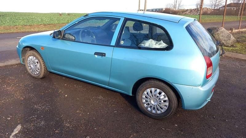 Gebraucht Mitsubishi Colt 75 PS (55 kW) 1996 F89 Limousine