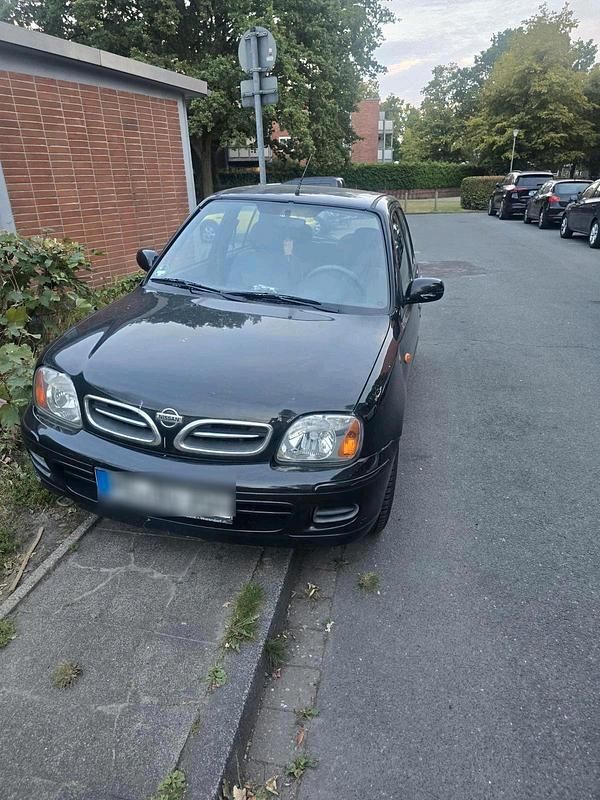 Schwarz Gebraucht 2002 Nissan Micra Kleinwagen | 1.650 € - Bild 1/4