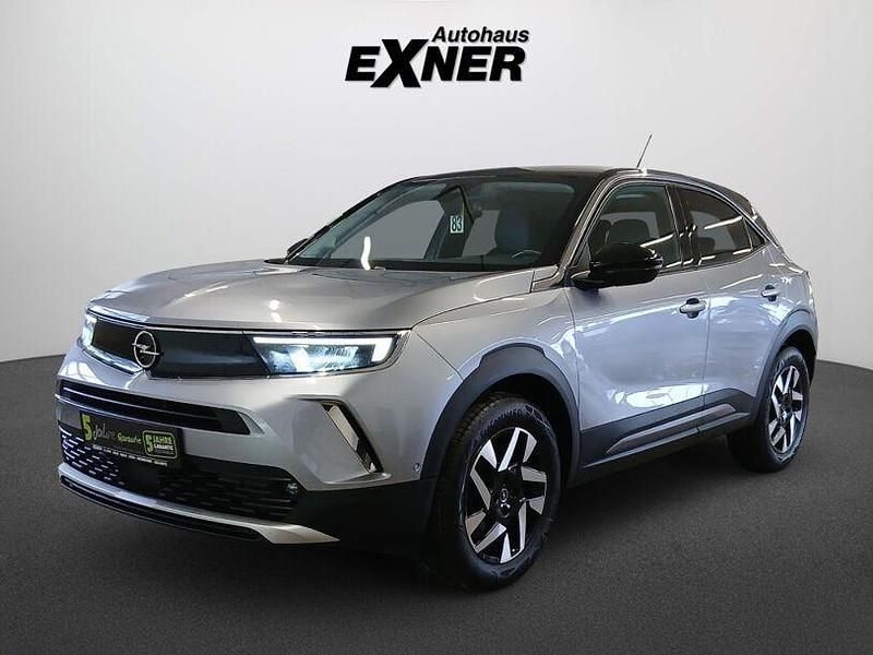 Gebraucht Opel Mokka Elegance 131 PS (96 kW) 2022 Quarz silber / dach schwarz SUV