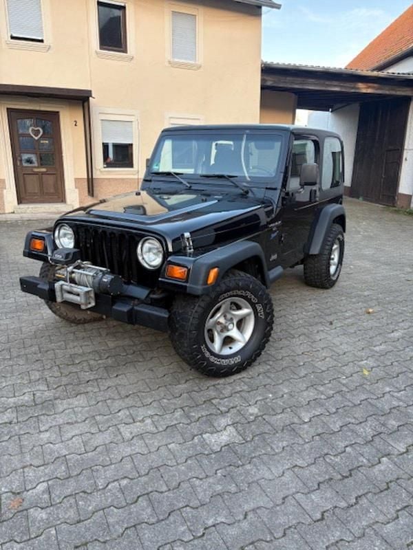 Schwarz Gebraucht 1997 Jeep Wrangler Sport SUV | 16.500 € (Etwas zu teuer) - Bild 1/4
