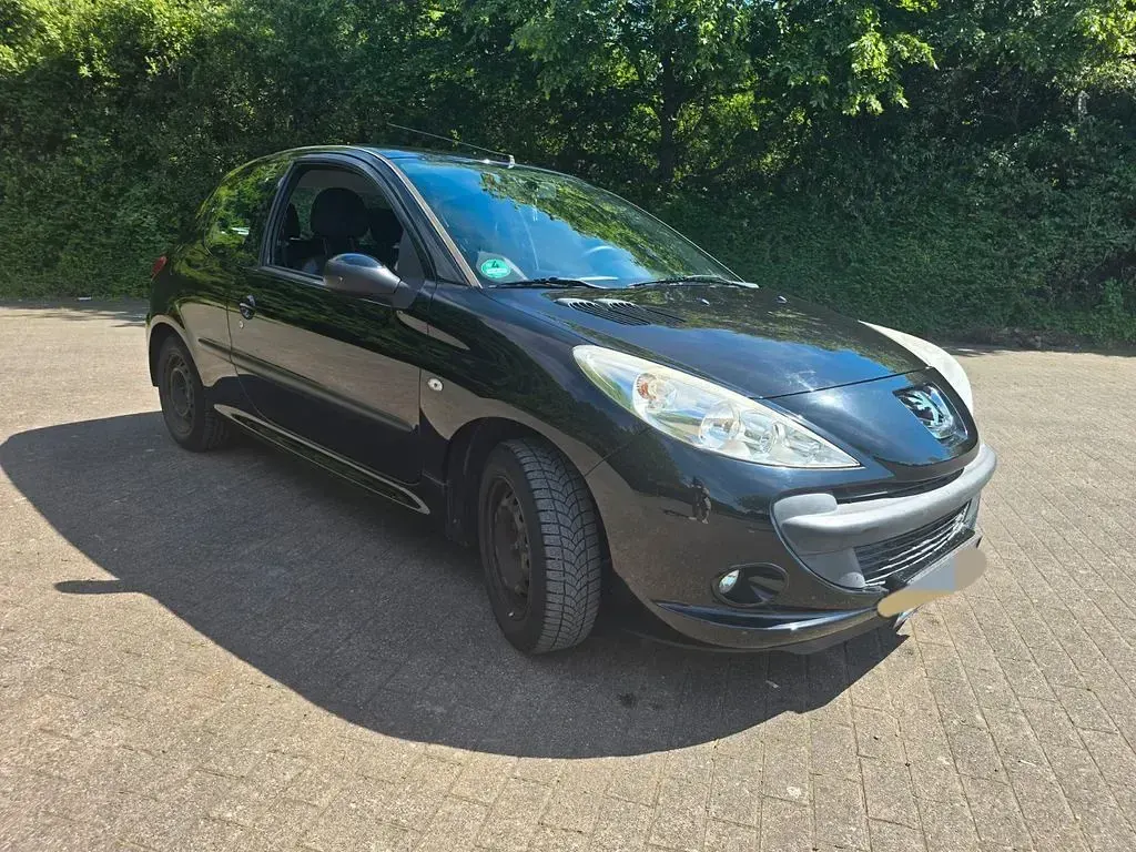 Gebraucht Peugeot 206 60 PS (44 kW) 2010 Schwarz Limousine