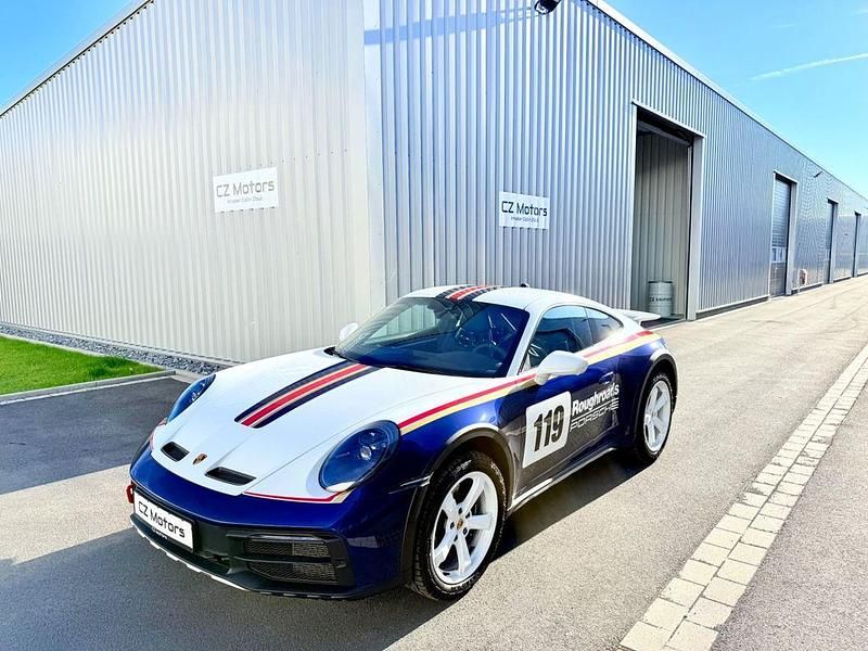 Weiß / einzianblaumetallic Gebraucht 2023 Porsche 992 Coupé | 285.900 € - Bild 1/4