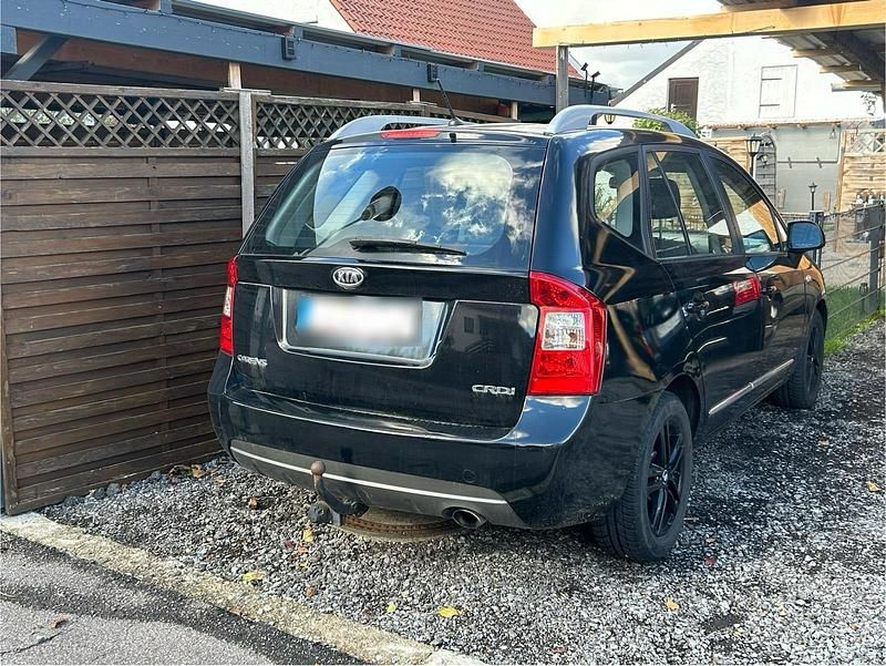 Gebraucht Kia Carens 128 PS (94 kW) 2012 Schwarz Van / Kleinbus