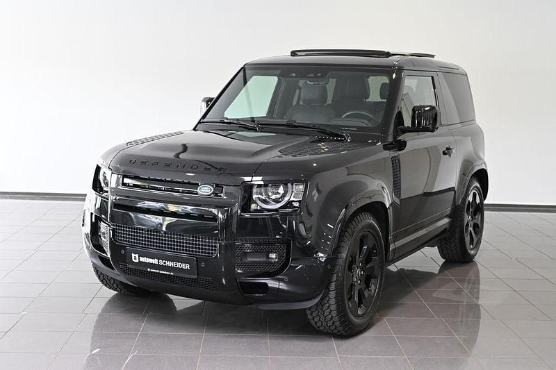 Schwarz santorini black metallic (metallic) Gebraucht 2024 Land Rover Defender SE SUV | 66.750 € (Superpreis) - Bild 1/4