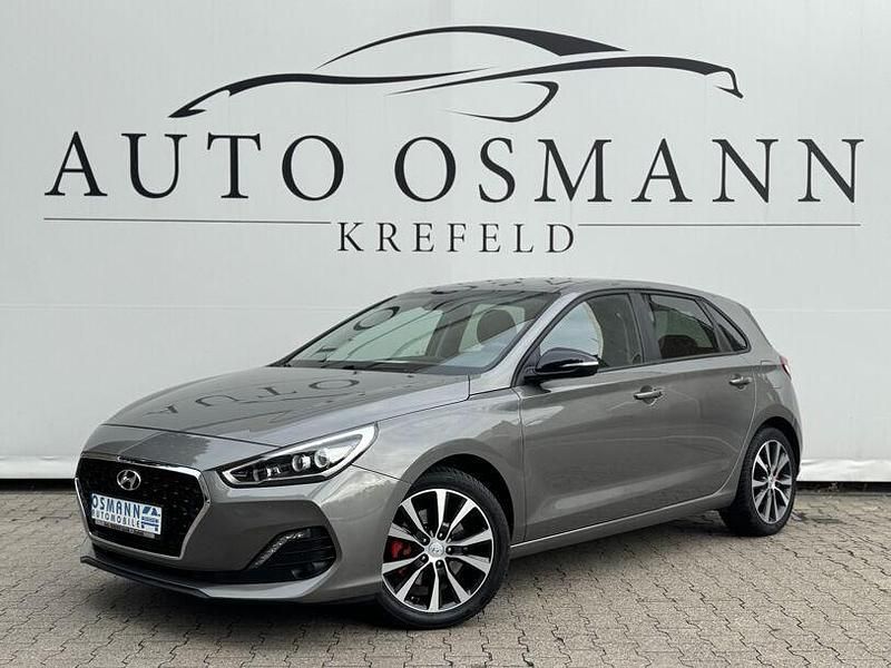 Olivine grey / met Gebraucht 2019 Hyundai i30 YES! Limousine | 16.900 € (Fairer Preis) - Bild 1/4