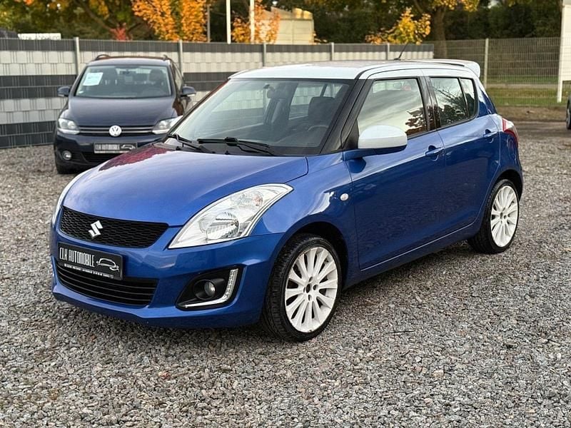 Blau Gebraucht 2015 Suzuki Swift Kleinwagen | 5.699 € (Fairer Preis) - Bild 1/4