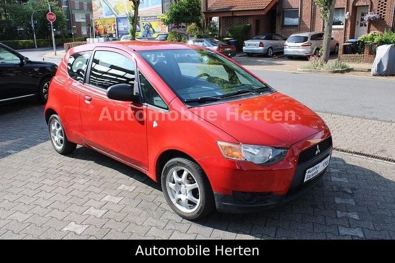 Gebraucht Mitsubishi Colt Inform 95 PS (69 kW) 2009 Rot Kleinwagen