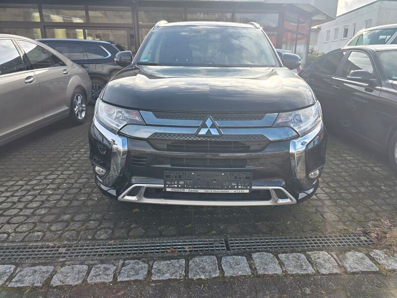 Schwarz Gebraucht 2021 Mitsubishi Outlander P-HEV Basis SUV | 21.900 € (Fairer Preis) - Bild 1/4