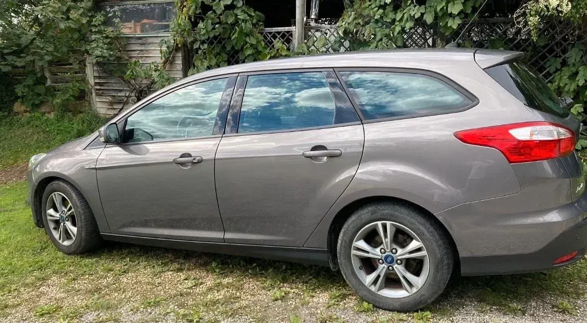 Używany Ford Focus 125 KM (91 kW) 2014 Szary Kombi
