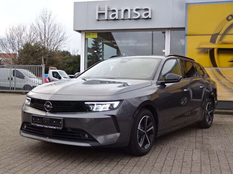 Grau/typ aussenverkleidung met Gebraucht 2024 Opel Astra Enjoy Kombi | 23.950 € (Fairer Preis) - Bild 1/4