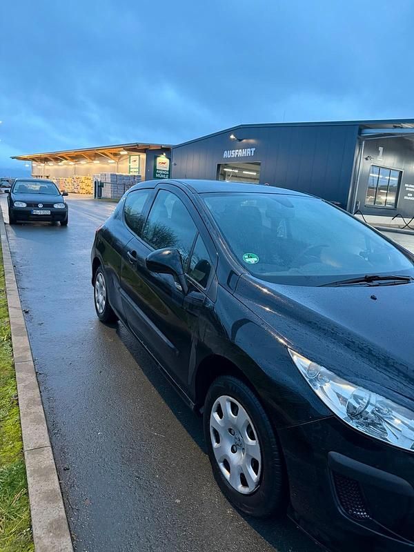 Gebraucht Peugeot 308 95 PS (69 kW) 2010 Schwarz Kleinwagen